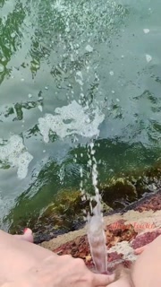 Strong Long Power Pissing in the river