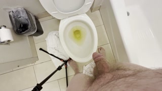 Cock Unleashes a Hot Piss Stream Straight into the Toilet