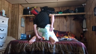 pup plays with whip and toy